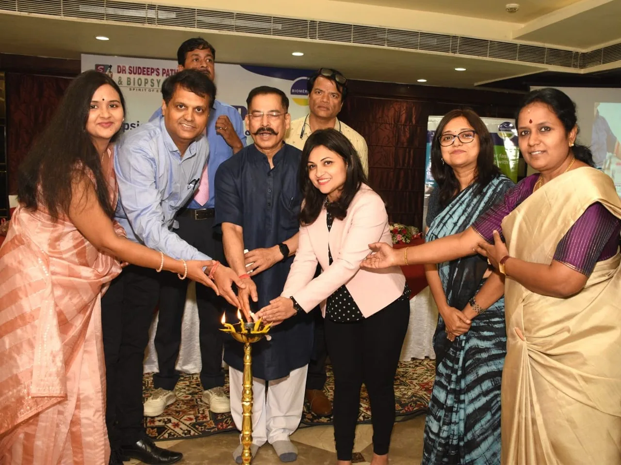 Dr. Sudeep Thakur MD Pathology in his office with advanced microscopy tools.