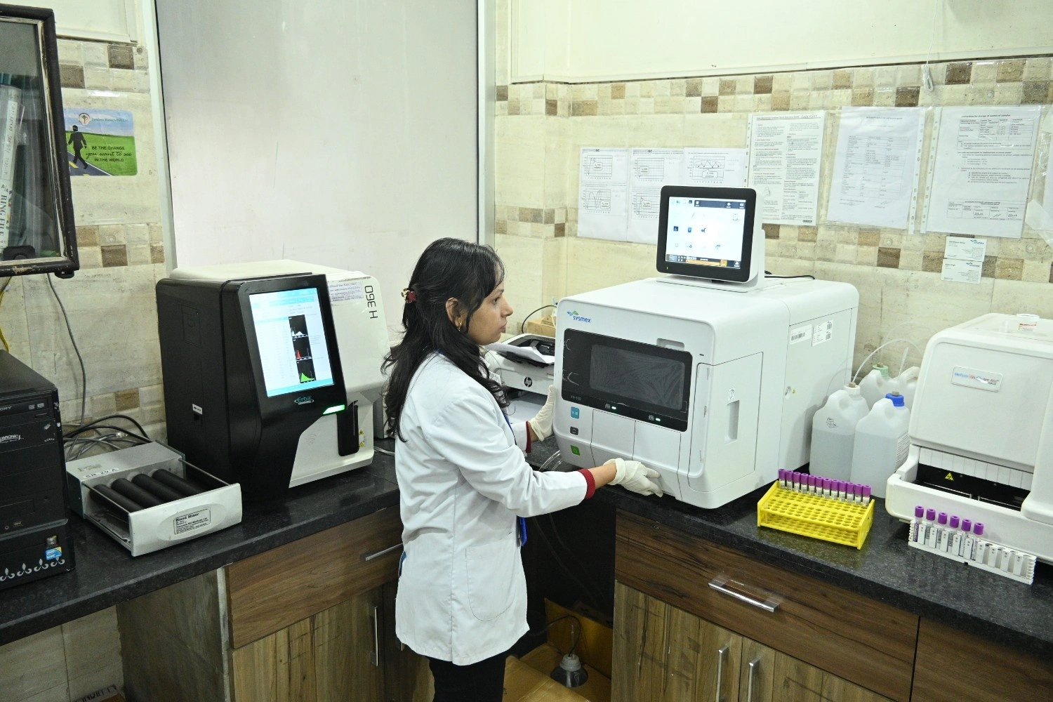 Advanced hematology analyzers and laboratory equipment at Dr. Sudeep’s Pathology Centre.