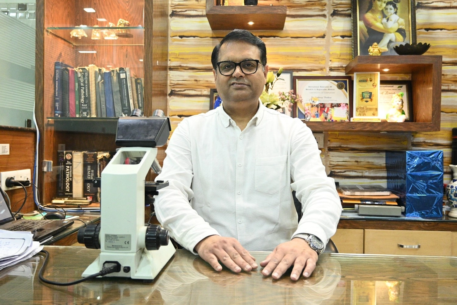 Medical laboratory workstation for blood culture and microbiology at Dr. Sudeep's Pathology.